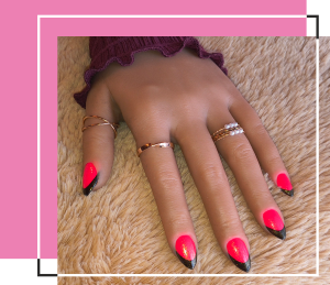 Neon nails with black top and gold glitter top coat.