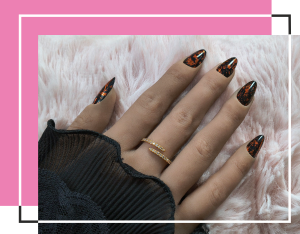  Black-based nails with copper leaf accents