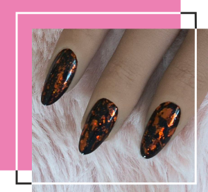 Black nails with copper leaf.