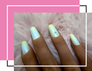 White pearl nails with light yellow gradiant tops.
